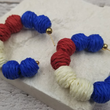 Load image into Gallery viewer, Liberty Pom Pom Hoops
