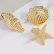 Load image into Gallery viewer, Mini Shell Hair Clips
